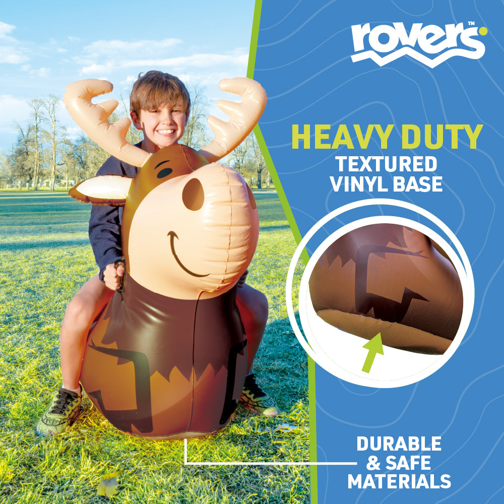 Child riding an inflatable moose in a grassy field with Rovers branding and product features.