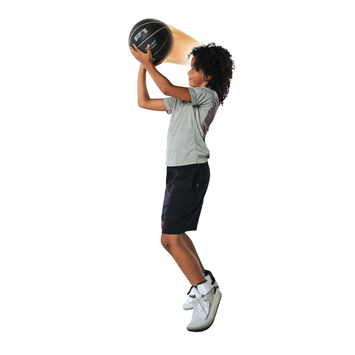 Player practicing a shot with the P1 Silent Shot Basketball
