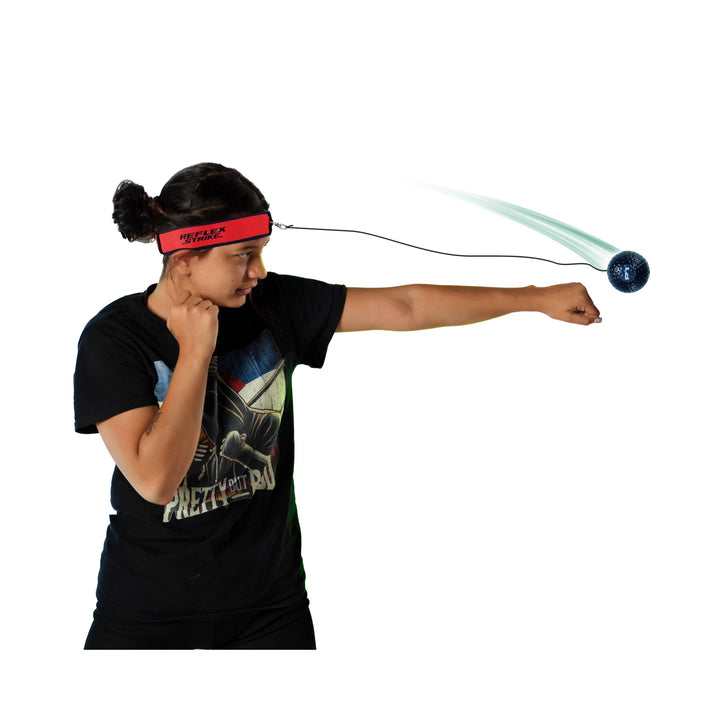 Player practicing with the P1 Reflex Strike red headband and black rebound ball; motion effect shown